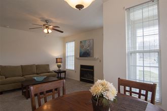 a living room with a couch and a table