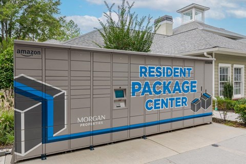 A grey and blue building with the words "Resident Package Center" on it.