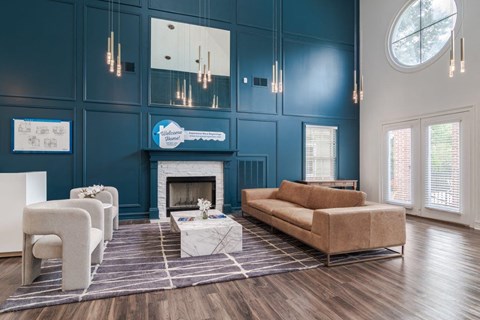 A living room with a fireplace and a sofa.