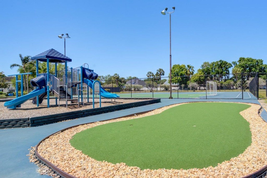 a playground with slides at a park