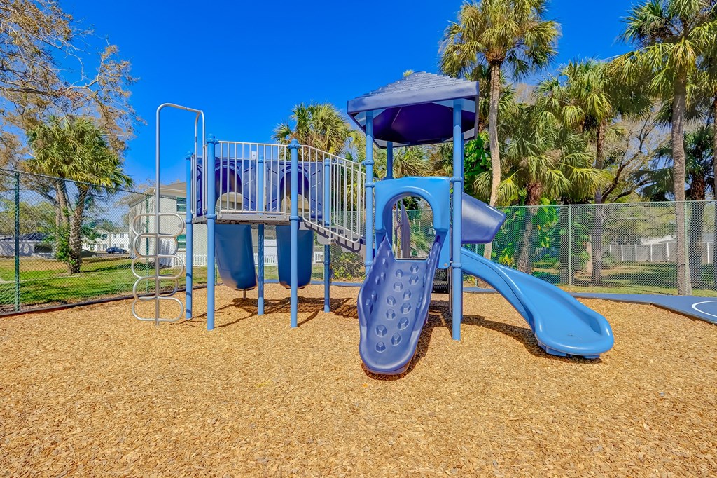 our playground is equipped with a swing set and slides