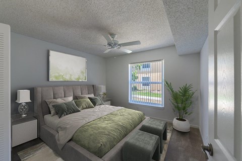 a bedroom with a large bed and a ceiling fan