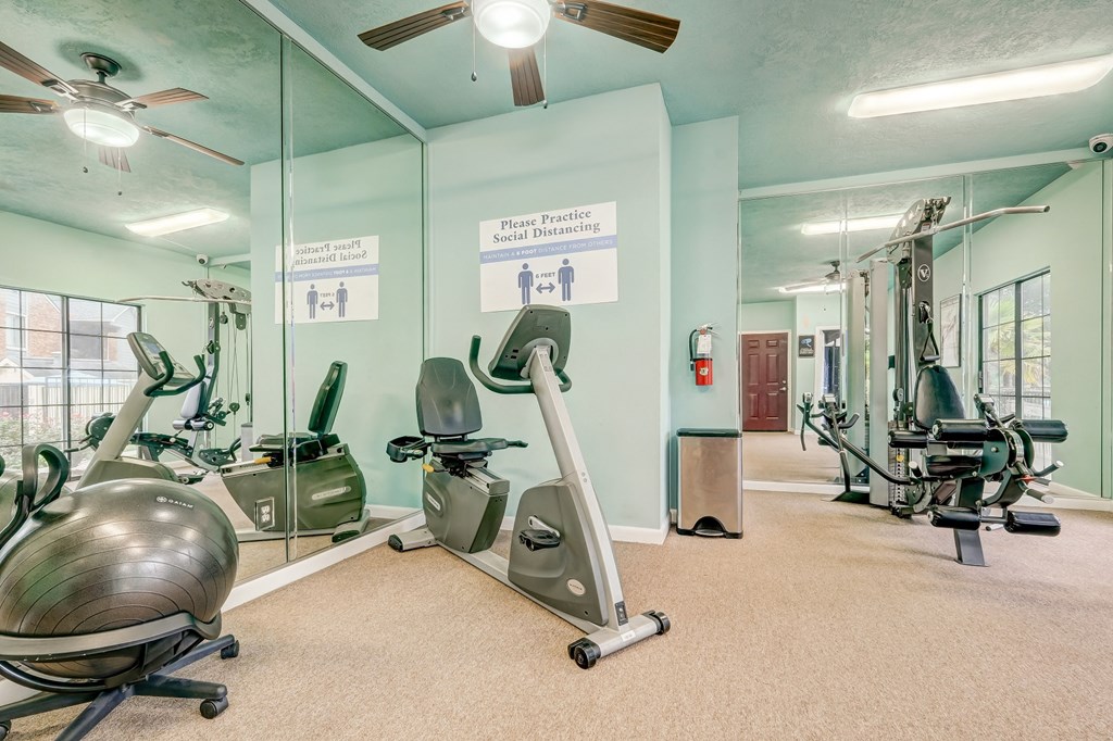 the gym with treadmills and other exercise equipment at villas at park ridge