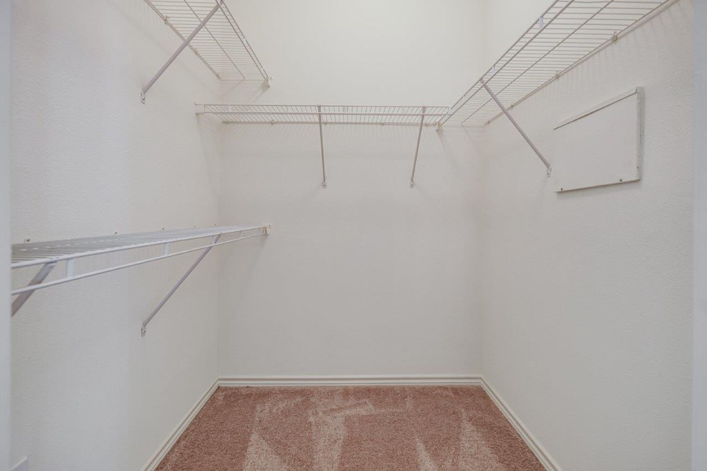 our spacious closets are equipped with shelves and hooks for hanging clothes