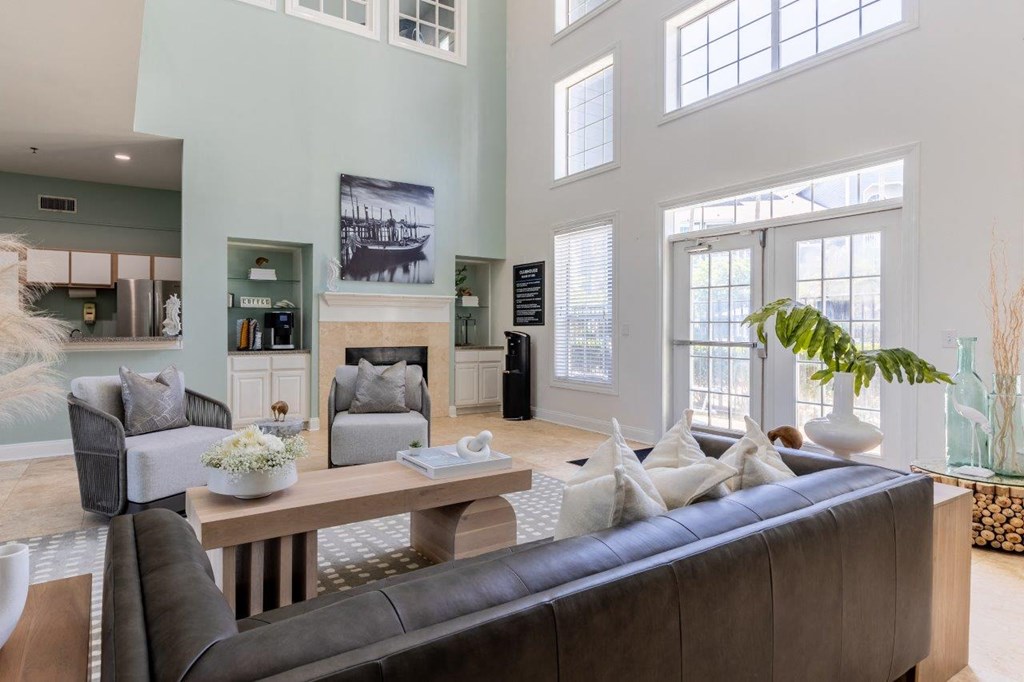 a living room with a couch and a table