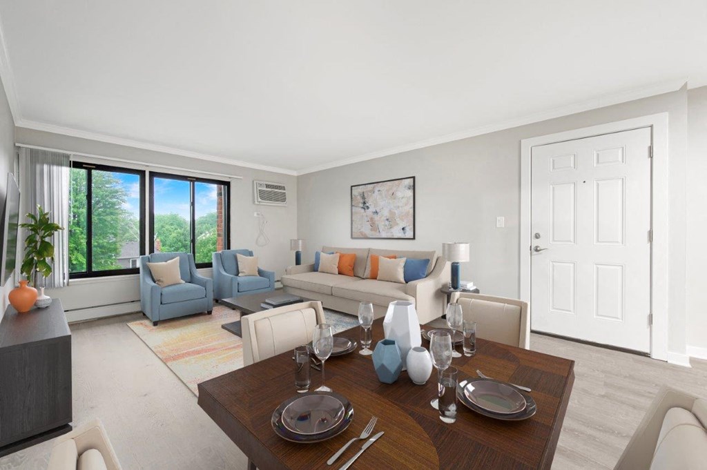 a living room with a couch and a table