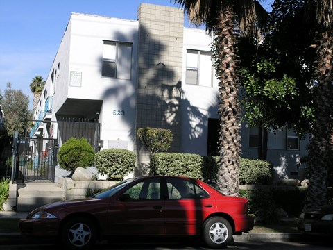 a car parked in front of a house