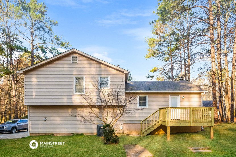a house with a porch and a deck