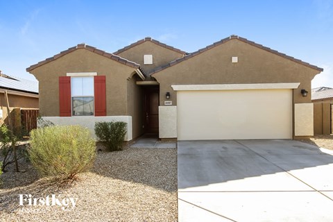 a house with a driveway and a garage door