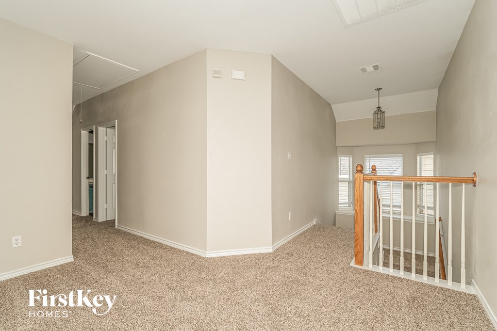 a nursery with a crib and a hallway with a door to a closet