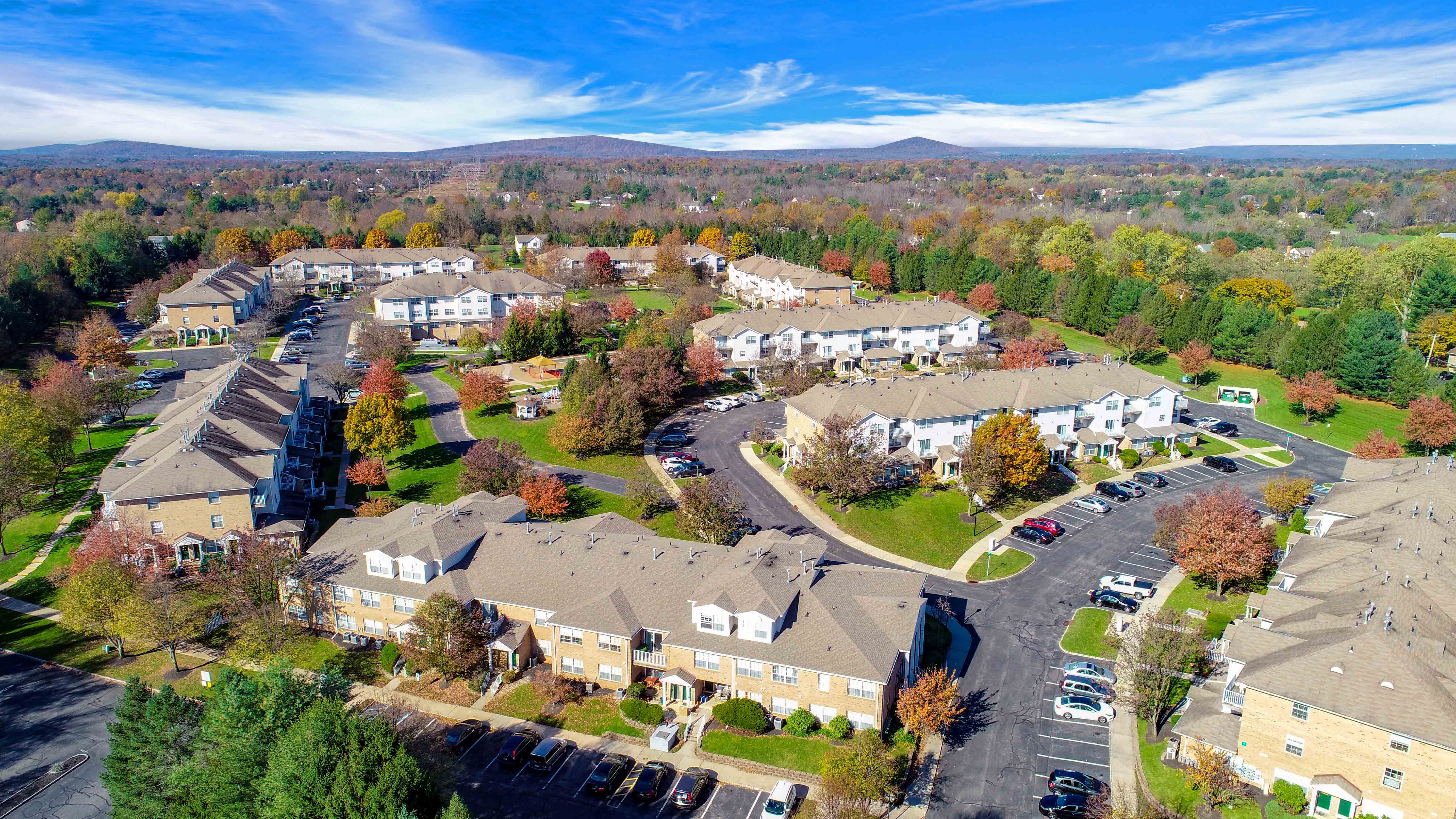 a aerial view of a neighborhood with houses and trees