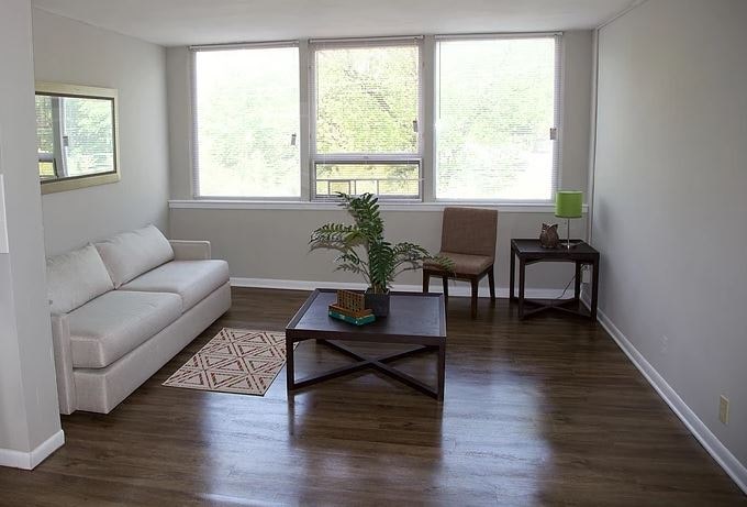 a living room with a couch and a coffee table