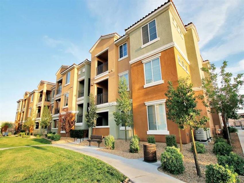 our apartments offer a spacious courtyard with green grass and trees