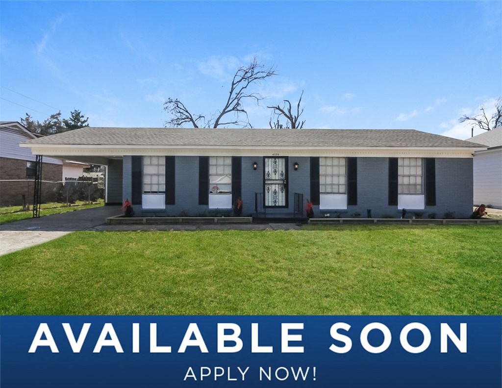 a large house with a lawn in front of it