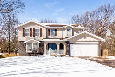 a house with snow on the ground