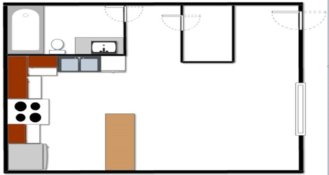 a floor plan of a room with a bathroom and a kitchen and a bedroom with
