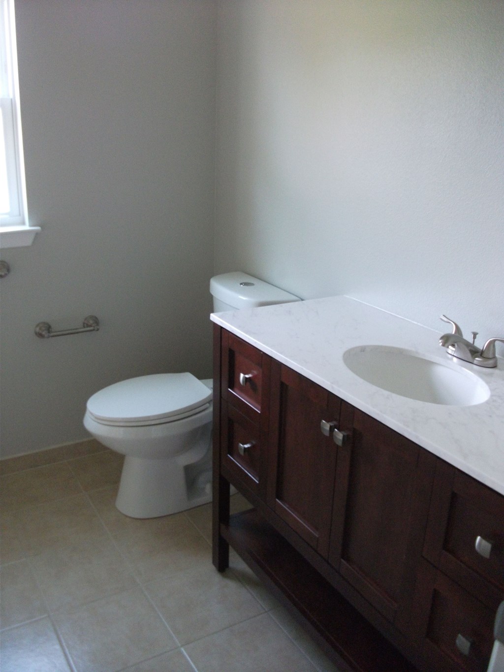 a small bathroom with a toilet and a sink