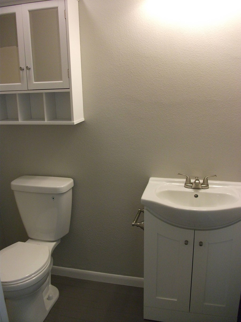 a small bathroom with a toilet and a sink