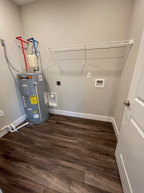 a bathroom with a vacuum cleaner in the corner