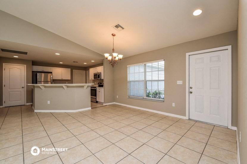 the kitchen and dining room are open to the living room