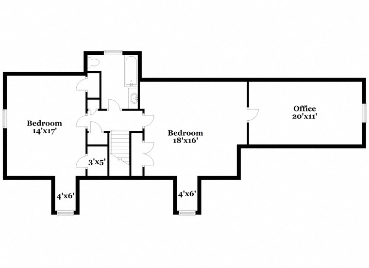 a floor plan of a house with two floors and a staircase