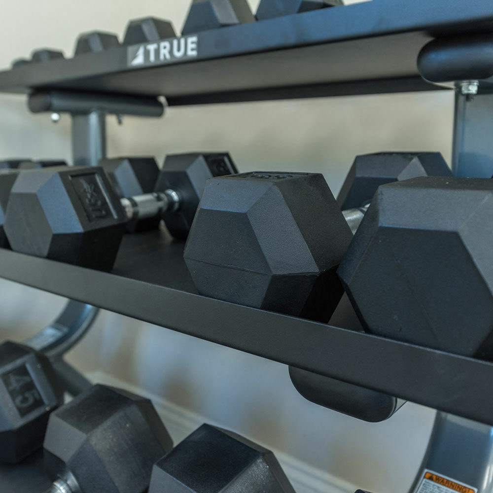 a close up of weights on a gym machine