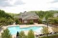 A house with a pool in the backyard.