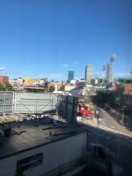 the view of the city from the window of a building