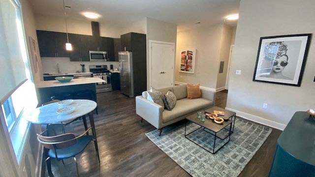 a living room with a couch and a table