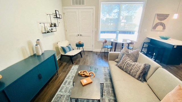 a living room with a couch and a television