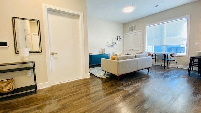 a living room with a couch and a table