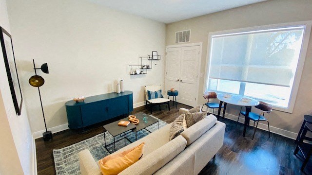a living room with a couch and a table