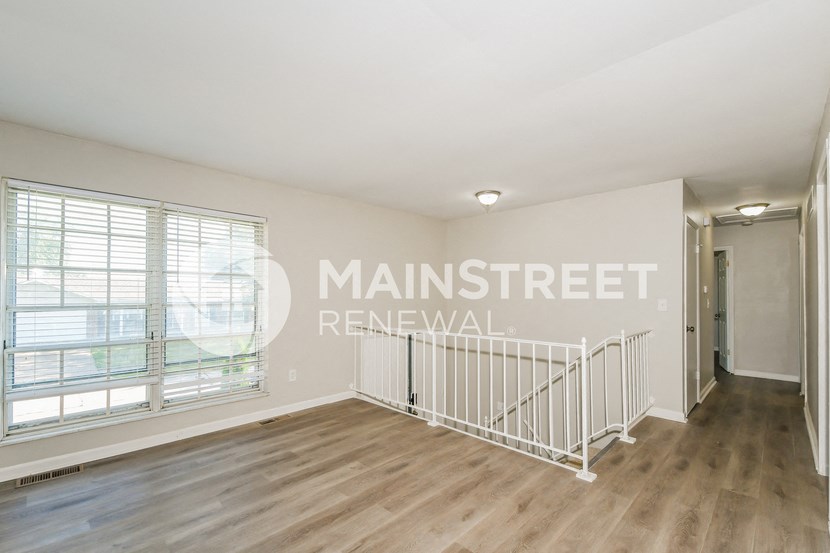 renovated living room and dining room of an apartment