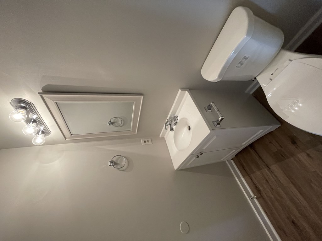 a small bathroom with a toilet and a sink