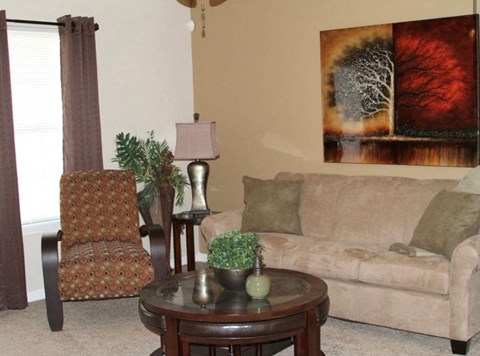 a living room with a couch and a table