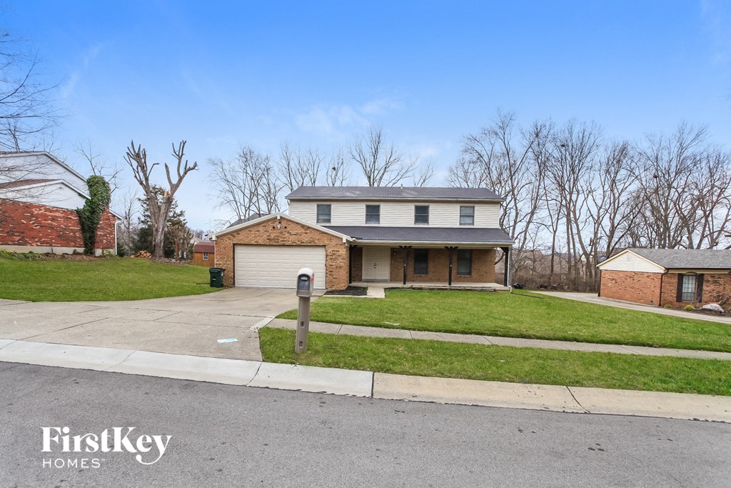 A house with a garage is for sale by FirstKey Homes.