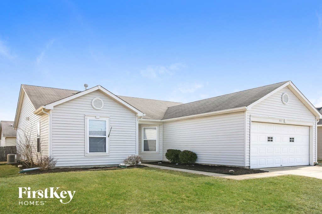 A two-story house with a garage is for sale by FirstKey Homes.
