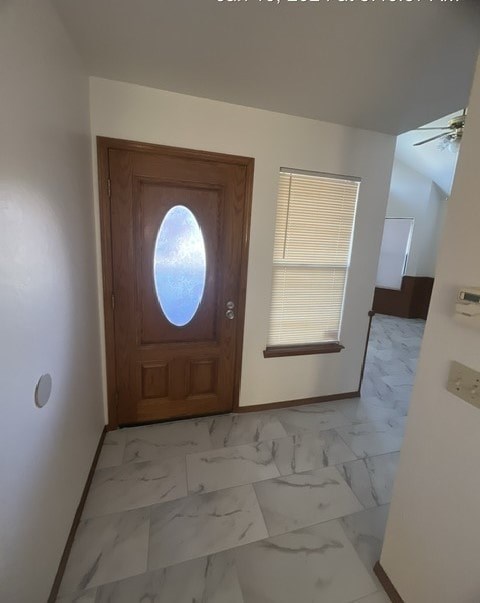 an empty room with a door and a window in it