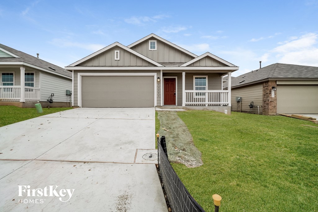 A house with a garage is for sale by FirstKey Homes.