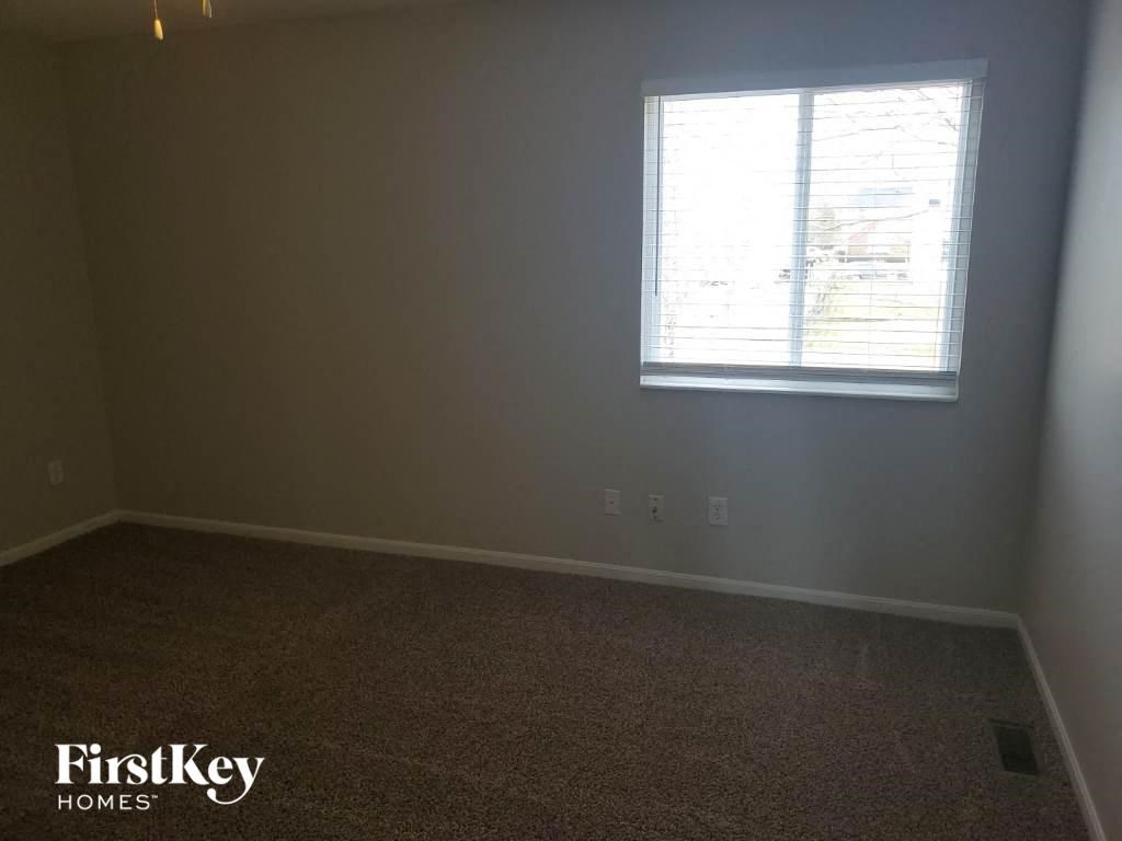 a empty room with a window in it