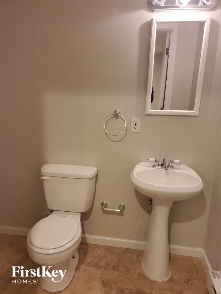 a small bathroom with a toilet and a sink