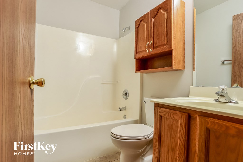 a bathroom with a toilet and a sink