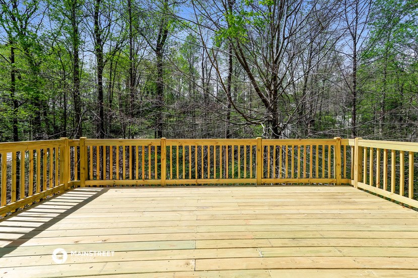 the deck has a view of the trees
