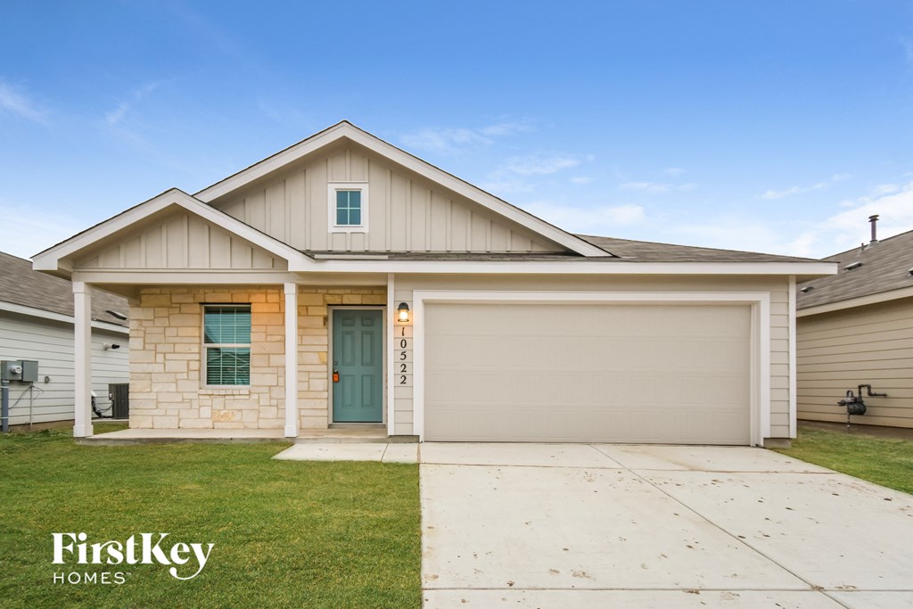 the front exterior of a home with a blue door