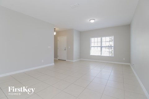 the living room and dining room are spacious and clean
