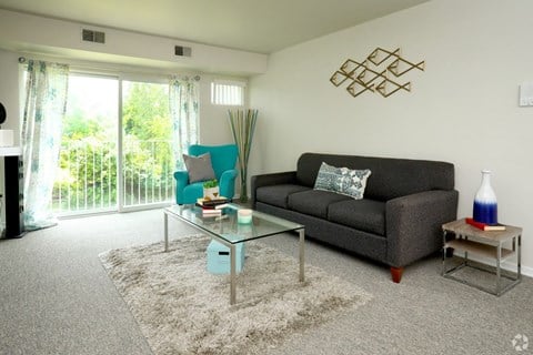 a living room with a couch and a coffee table