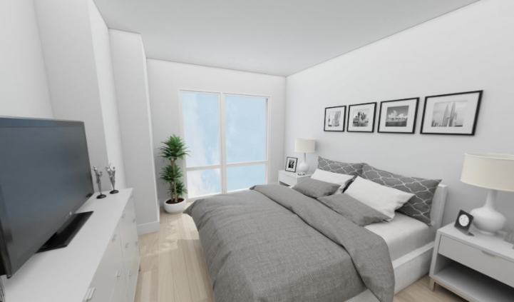 an image of a bedroom with a bed and a tv