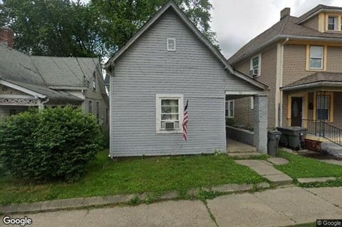 a house with an flag in the window
