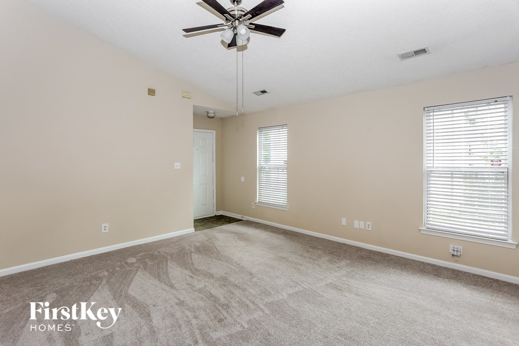 the living room is clean and ready for us to move in