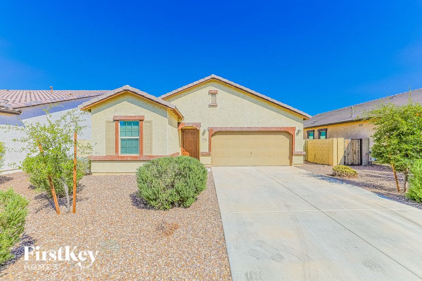 a house with a driveway and a garage door